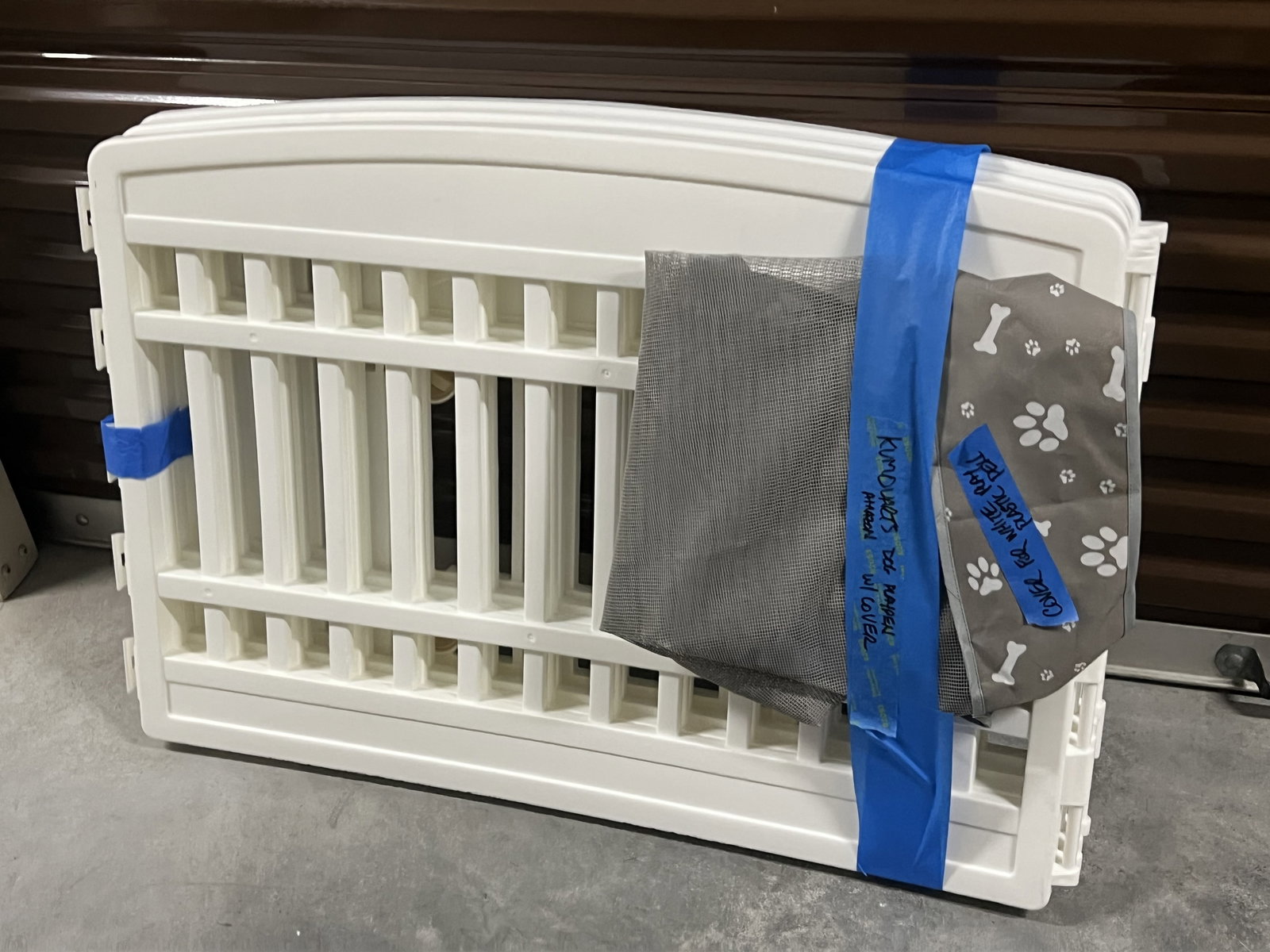 Paw Land Pet Gate: White wood and metal. Dimesions: L 144" x H 30" Condition: Very good. Low Estimate: 10.00 High Estimate: 10000.00