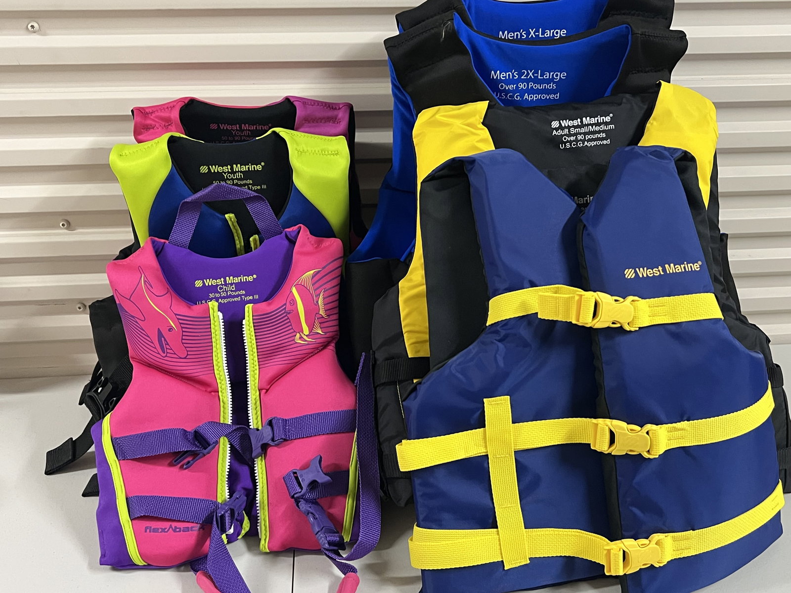 (7) West Marine Life Jackets: Three youth, 4 aduly. All in excellent condition. Low Estimate: 10.00 High Estimate: 10000.00