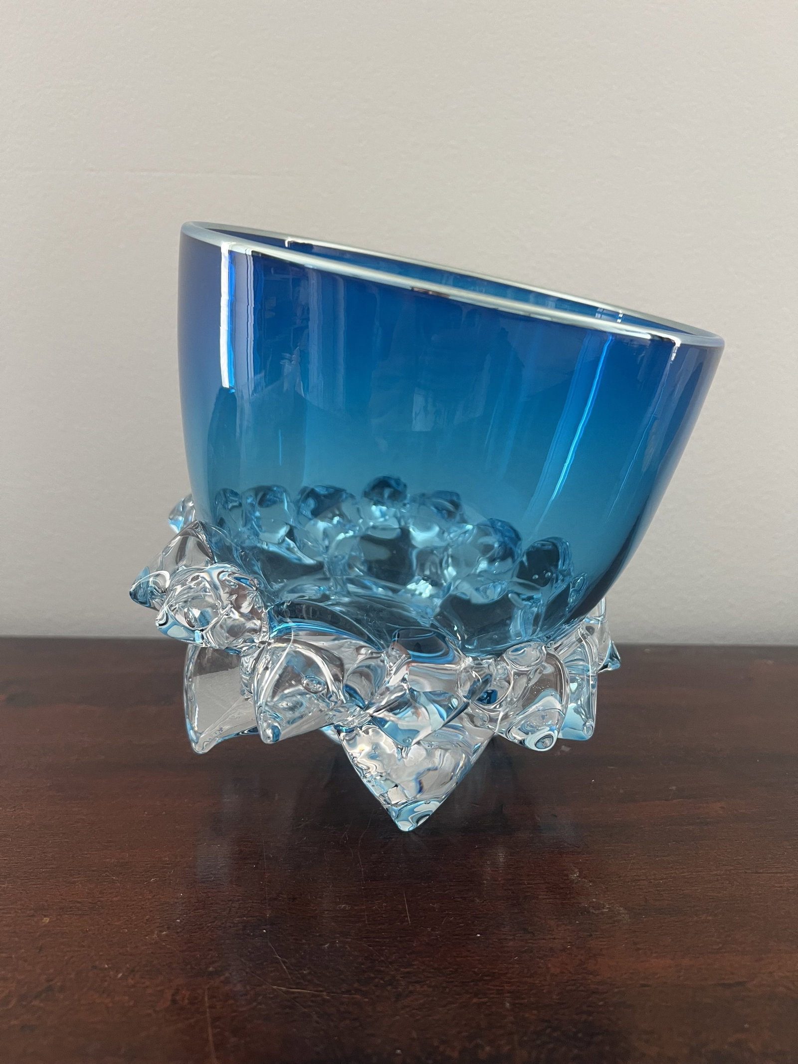 Axiom Glass Thorn Vessel Bowl in Aqua: Ocean blue art glass bowl, signed on the bottom by Andrew Madvin. Dimensions: H 8" x Dia: 7" Condition: Very good. Low Estimate: 10.00 High Estimate: 10000.00