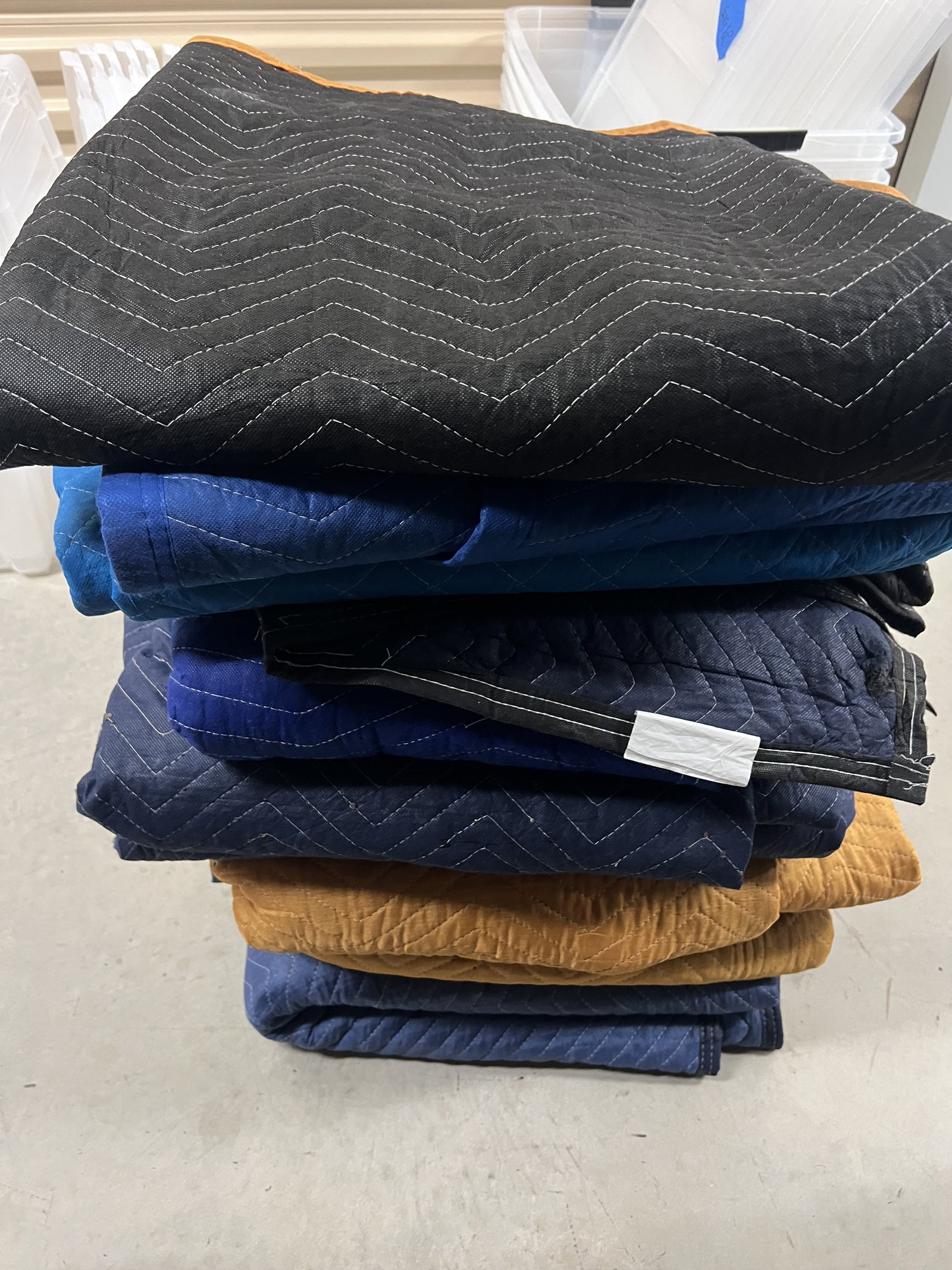 (12) Moving and Storage Pads: Moving pads. Condition: Used, normal wear and use. Low Estimate: 10 High Estimate: 10000