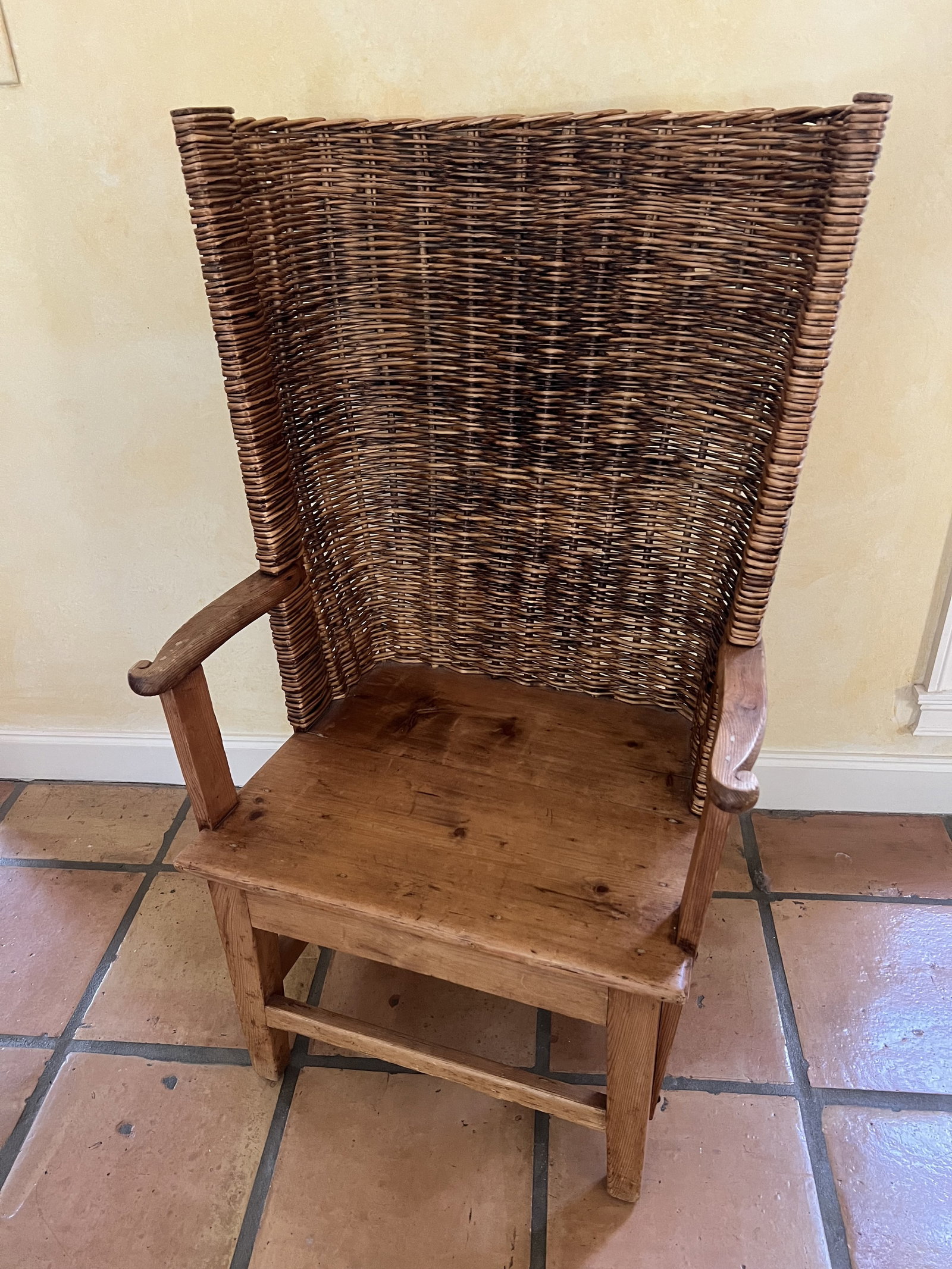 Orkney Armchair: A single Scottish arm chair, with cushions. Wood and rush. Dimensions: H 41" x W 24.5" x D 17" Seat Height: 15" Condition: Normal antique condition with some natural splitting to wood on seat and mino