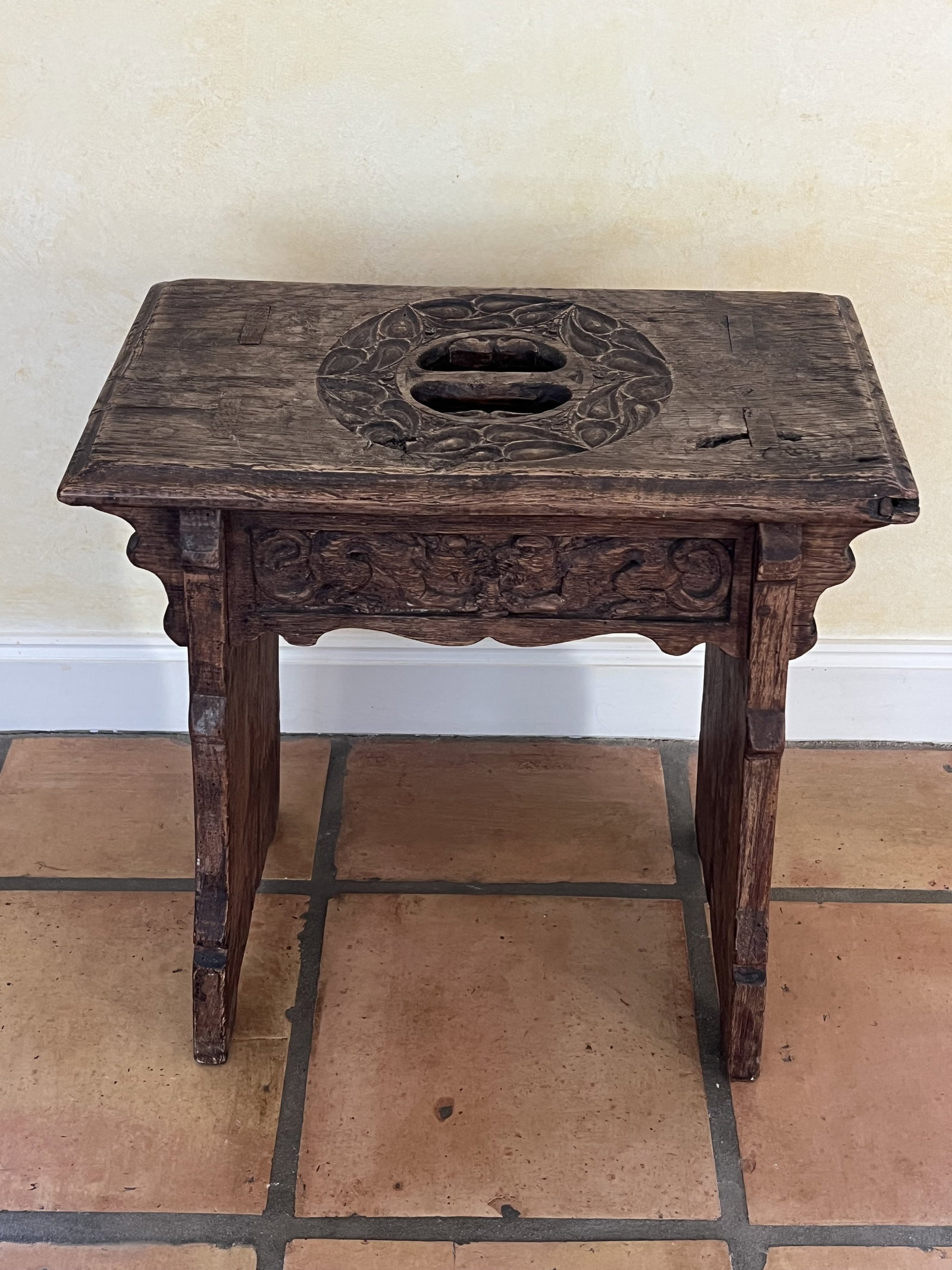 Antique Chinese Style Carved Wood Stool: One side with carved animal and the other with vine and fruit/flowers. Dimensions: H 20" x W 19" x D 10.5" Condition: Normal signs of age and use. Low Estimate: 10.00 High Estimate: 10000.00
