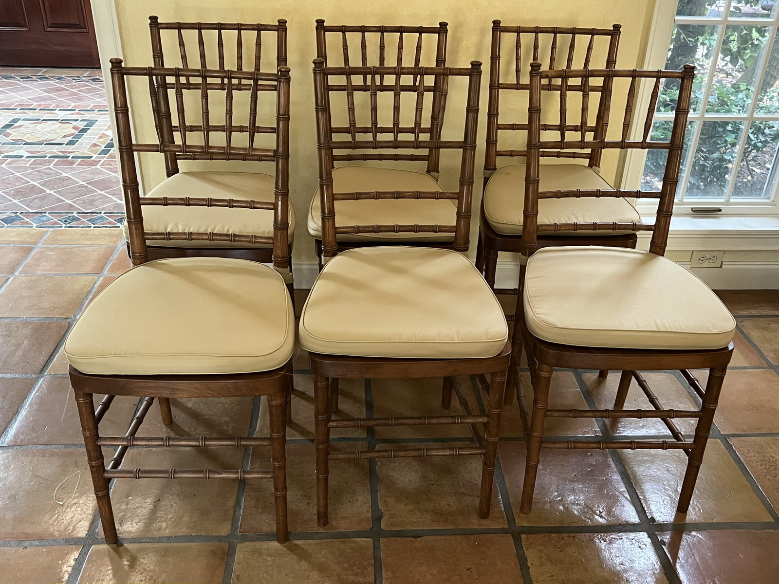 (6) Faux Bamboo Dining Chairs: Contemporary, solid wood with cushions. Dimensions: H 36" x W 15" x D 15" x Seat Height: 18" Condition: Cushions with some staining. Low Estimate: 10.00 High Estimate: 10000.00