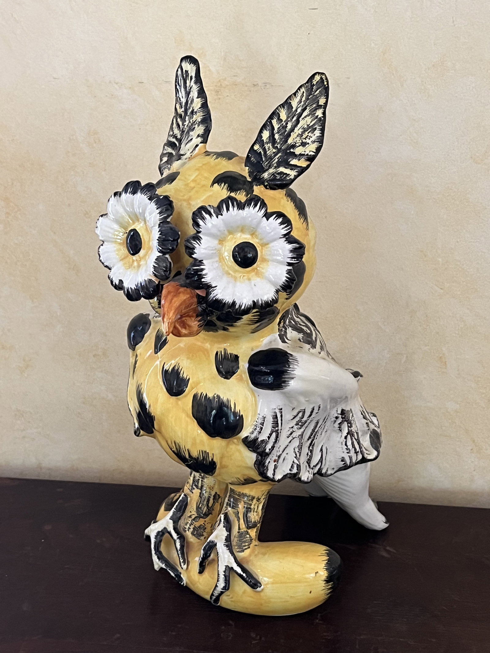 Vintage Italian Pottery Owl: Bright painted in yellow and black. Makers stickers and markings under. Dimension: 14" x W 6" x D 10" Condition: Minimally noticeable repair to beak. Low Estimate: 10.00 High Estimate: 10000.00