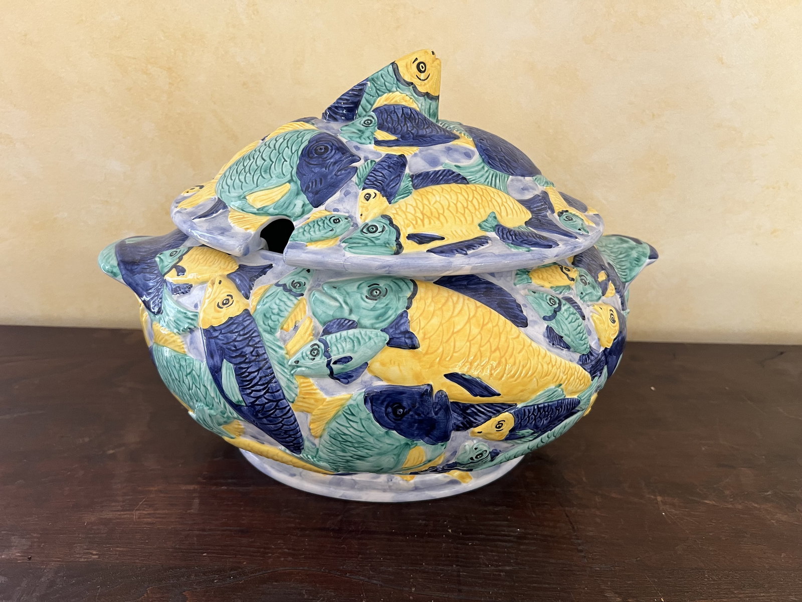 Italian Fish Soup Tureen: Glazed Italian pottery with colorful fish, no ladle. Marked Made in Italy on the bottom. Dimensions: L 15" x W 11" x H 12" Condition: Presenting well. Low Estimate: 10.00 High Estimate: 10000.00