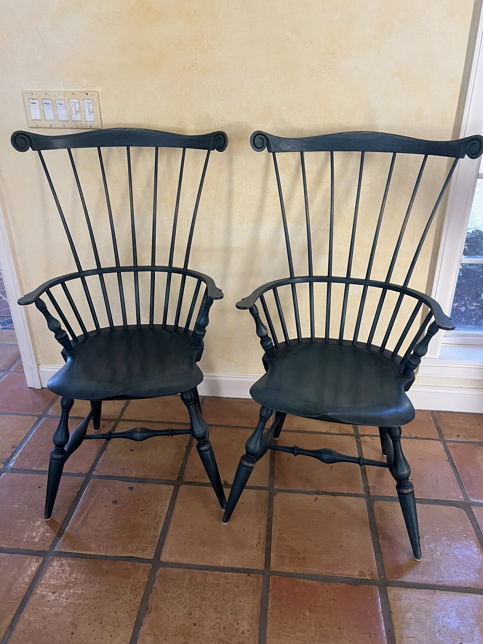 Pair of Warren Chair Works Windsor Comb Back Chairs: An antique reproduction, quality workmanship by Warren Chair company, handmade. An antiqued blue color. Dimensions: H 42" x W 23" x D 18" X Seat Height: 17.5" Condition: Handsome wear. Low Estimate: