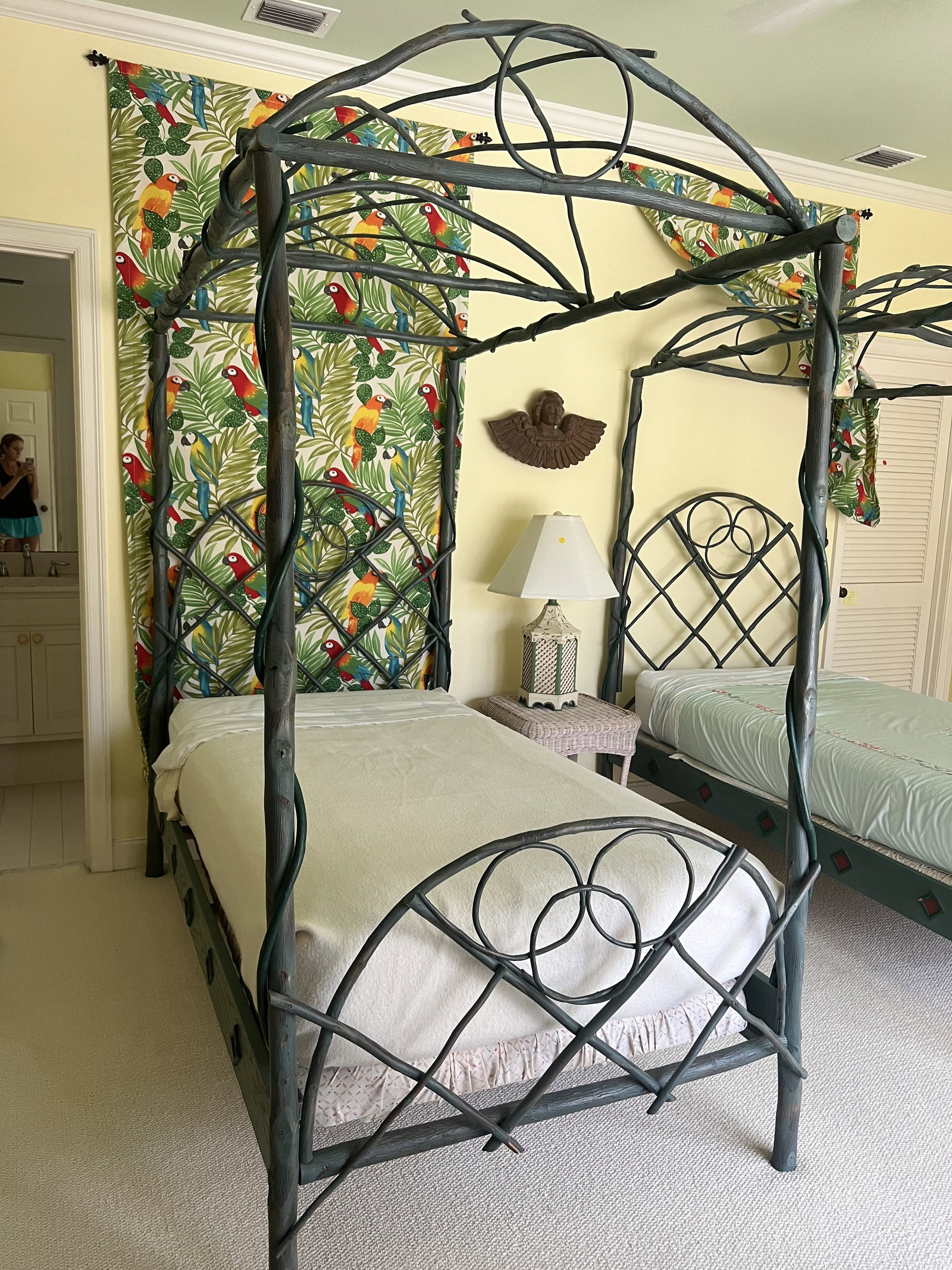 Twig Canopy Bed (2 of 2): A handmade single twin size bed made of twigs and sticks and painted a lovely blue, green, distressed. Maker unknown. Dimensions: H 7' x W 44" x L 81" Condition: used, minor signs. Low Estimate: 10.00