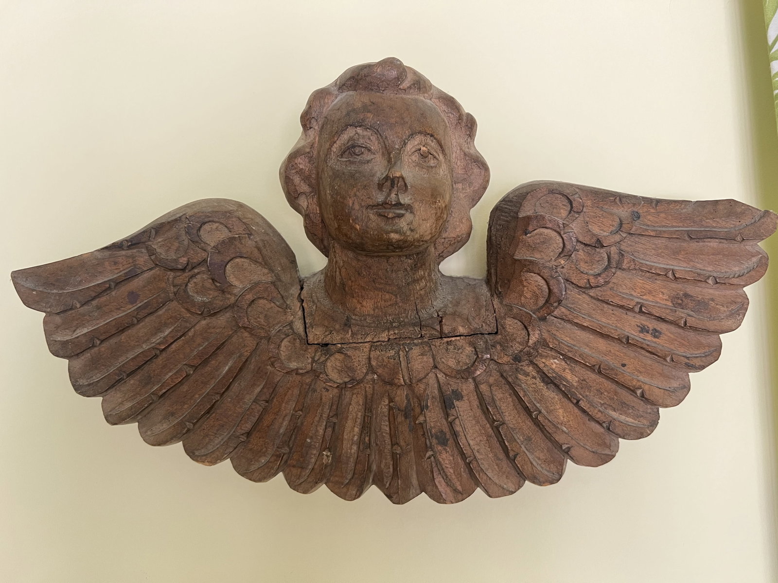 Carved Wooden Angel: Antique, carved wood of the bust of an angel. Dimensions: H 21" x L 12" x D 6" Condition: Presenting well. Low Estimate: 10.00 High Estimate: 10000.00