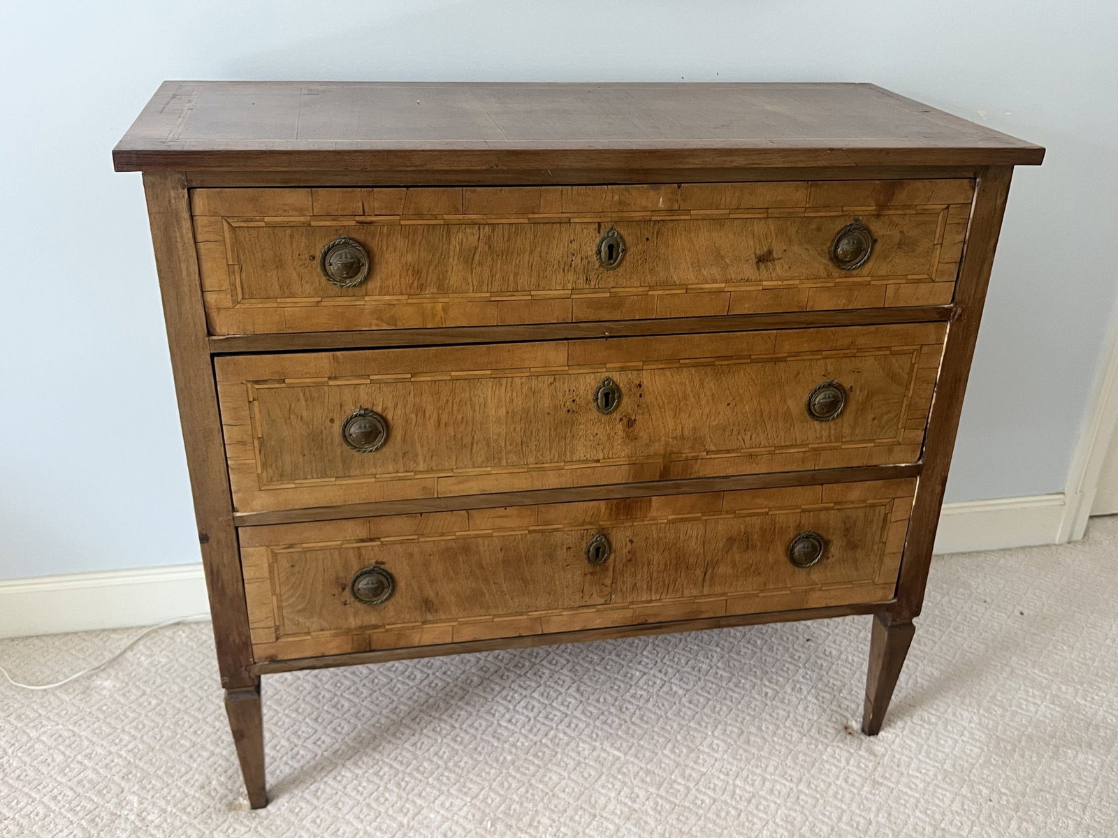Antique Three Drawer Dresser: Dimensions: H 35.5" x L 39.5" x D 17.5" Condition: Showing obvious signs of age, sun fading. Low Estimate: 10.00 High Estimate: 10000.00