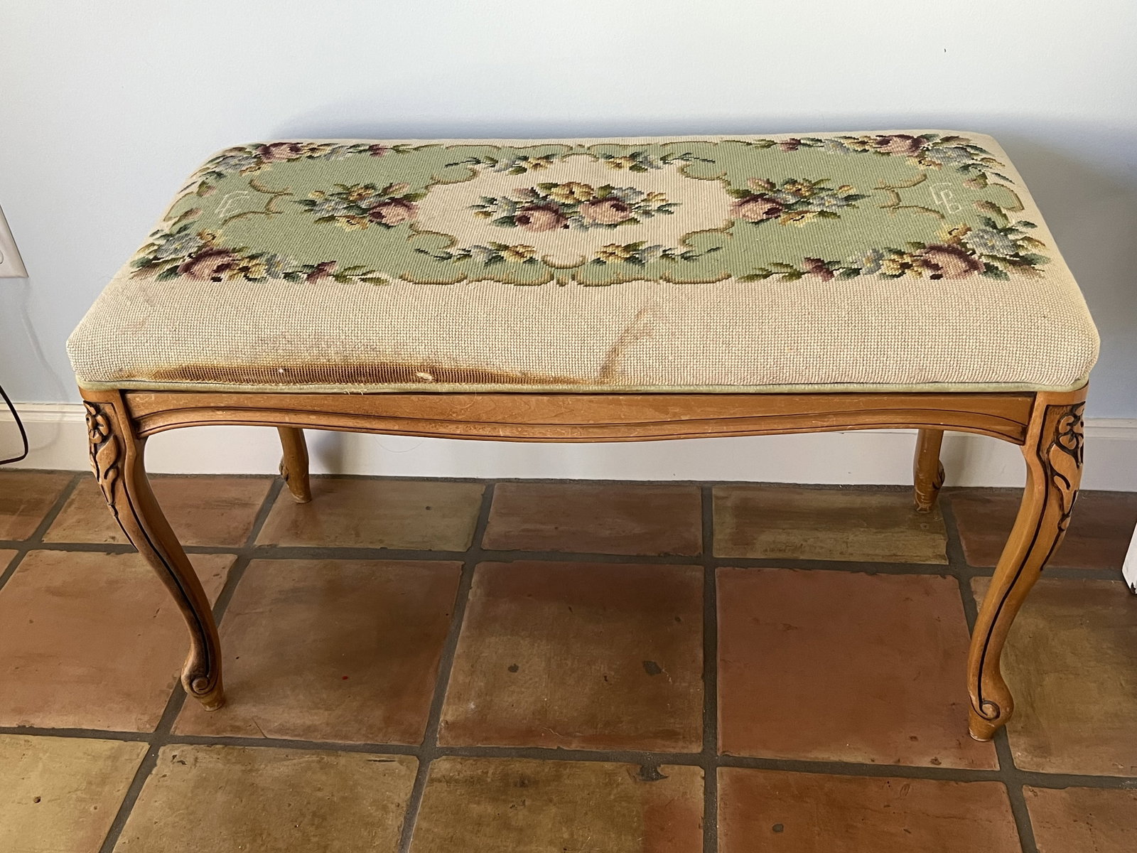 Vintage French Style Needlepoint Bench: Vintage bench with antique needlepoint. Dimensions: H 21" x L 36" x D 17" Condition: Wear. Low Estimate: 10.00 High Estimate: 10000.00