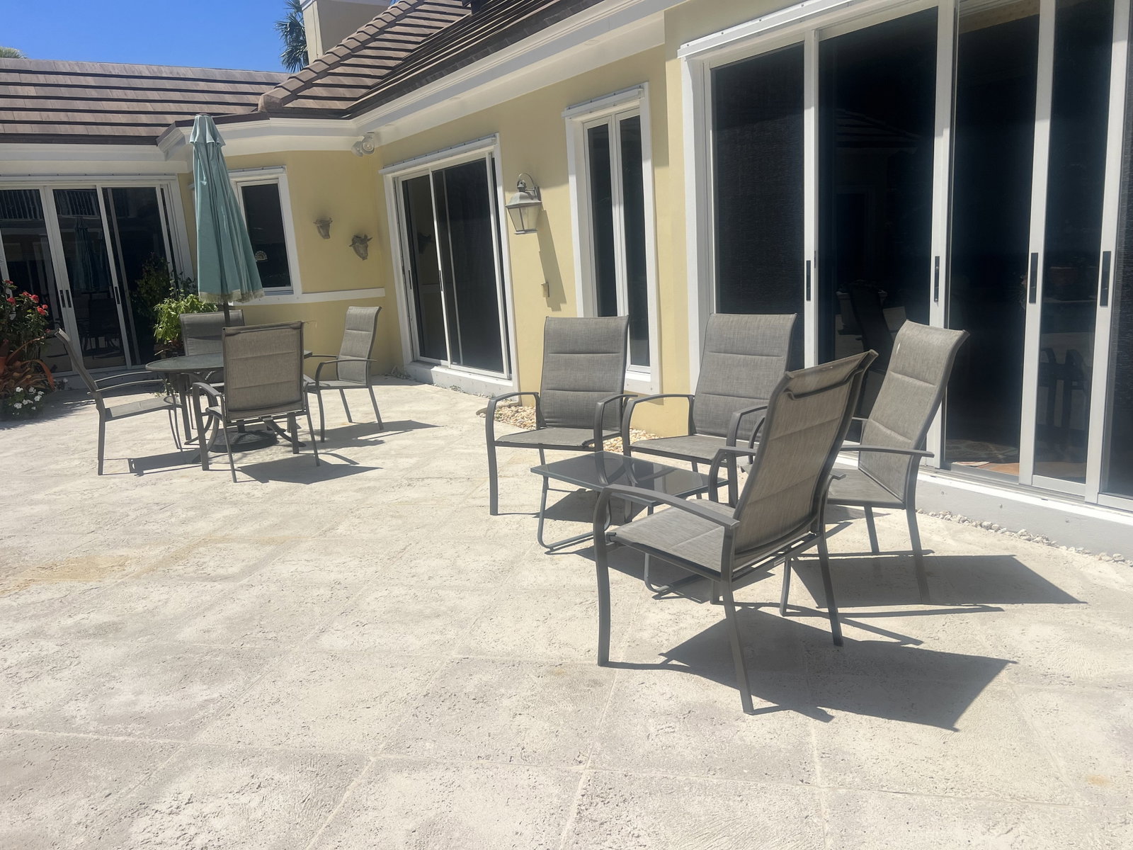 Outdoor Furniture Set: Including 8 Style Well chairs, a round dining table and a small coffee table. Dimensions: table: 4' Low Estimate: 10.00 High Estimate: 10000.00
