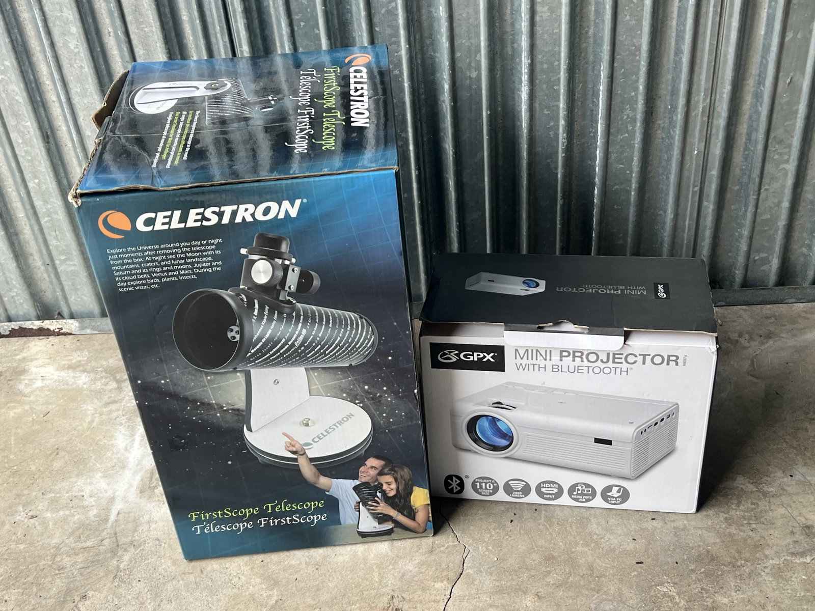 Grouping of Electronics: Celestron Telescope and a GPX Mini Projector with bluetooth. Low Estimate: 10.00 High Estimate: 10000.00