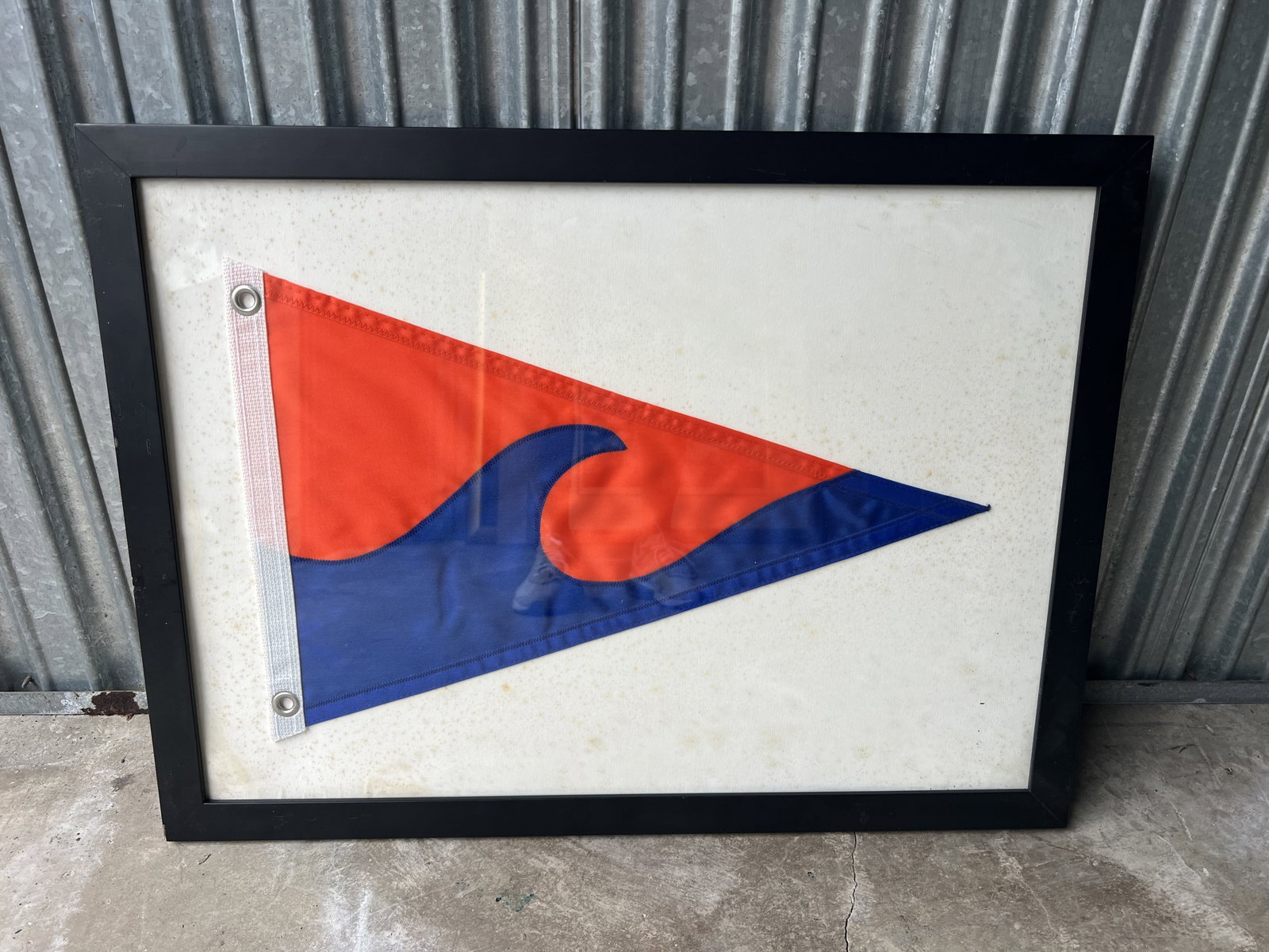 Nautical Framed Miami Yacht Club Burgee Flag: Miami flag or similiar design. Flag is clean, paper with some foxing. Dimensions: Frame: H 18.5" x W 25" Condition: Signs of age. Low Estimate: 10.00 High Estimate: 10000.00