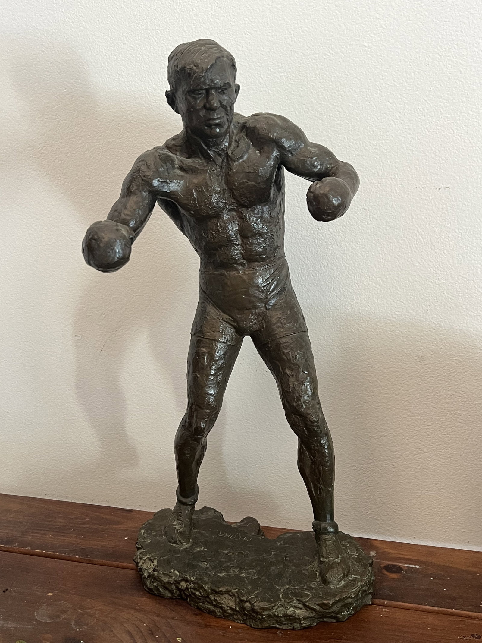 M-Corr Signed Boxer Bronze Sculpture: A vintage bronze sculpture, signed M-CORR. A great, large size! Dimensions: H 25" x W 13" x D 8" Condition: Very good. Low Estimate: 10.00 High Estimate: 10000.00