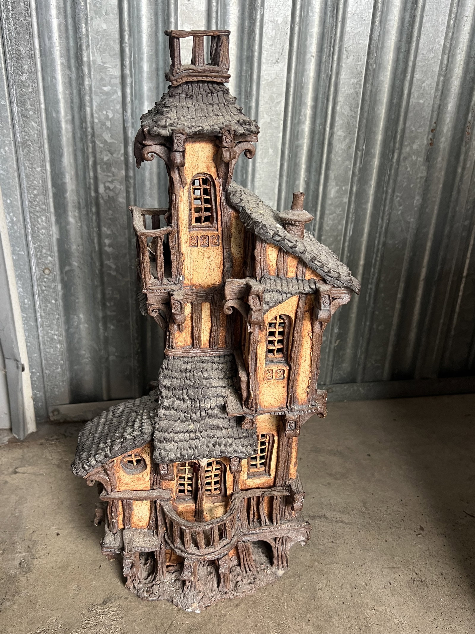 Ben Klinefelter Stoneware house: Ceramic or pottery house, signed. Dimensions: H 17.5" x.W 6" Condition: Small areas of loss. Low Estimate: 10.00 High Estimate: 10000.00