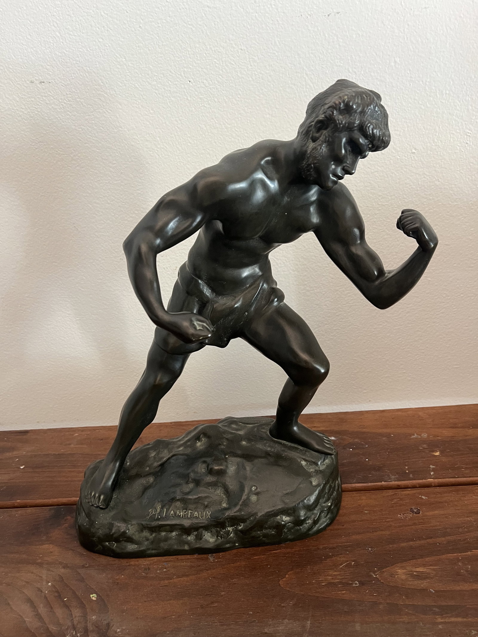 Jef Lambeaux (19th Century Belgian) bronze Sculpture: "The Boxer", 19th Century, French. Signed with Foundry marks as well. Dimensions: H 16" x W 10" x D 6" Good condition Low Estimate: 10.00 High Estimate: 10000.00