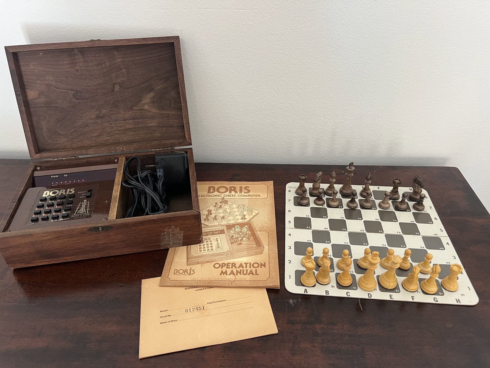 Boris Electronic Chess Computer: Vintage electronic chess game. Dimensions: Box:10" x 7" Condition: missing a pawn. Low Estimate: 10.00 High Estimate: 10000.00