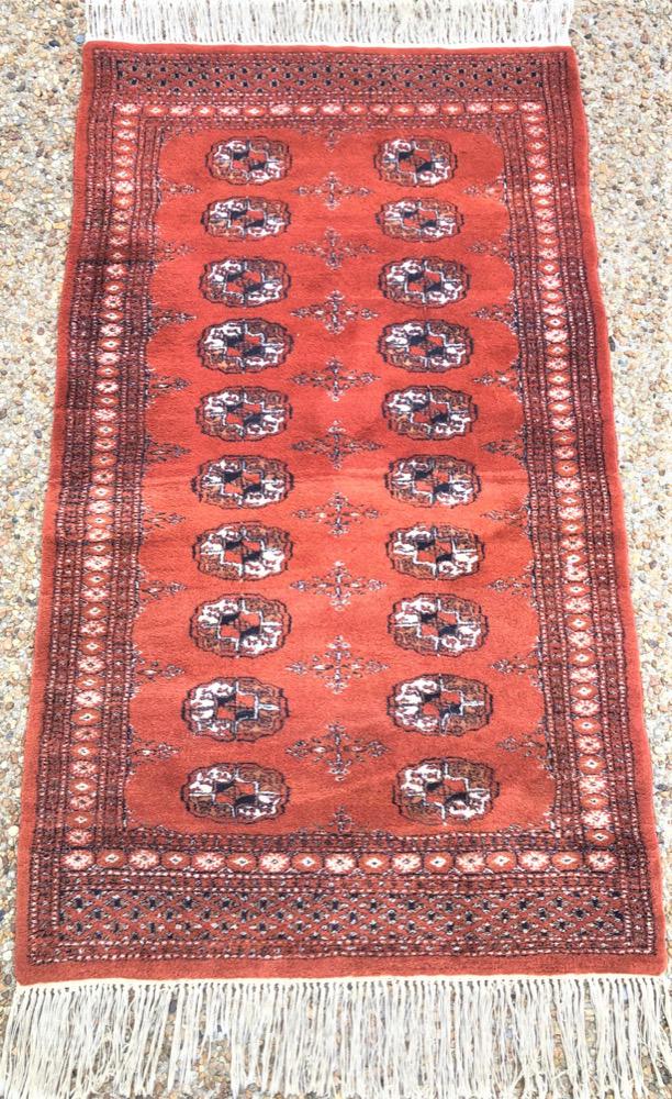 BUKHARA TEKKE HAND KNOTTED RUG, 3.1 x 5.4: Bukhara Tekke rug was hand knotted in Pakistan of 100 percent natural wool. It has medium, even, wool piles and is in excellent condition. Beautiful colors with excellent quality. No holes or repairs,