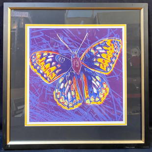 ANDY WARHOL (1928-1987) COLOR GICLEE TITLED BUTTERFLY – 22IN x 22IN: Color giclee by celebrated American artist Andy Warhol (1928-1987). It is signed by the artist in the lower right and it is titled Butterfly after the original. It is matted and framed under glass in