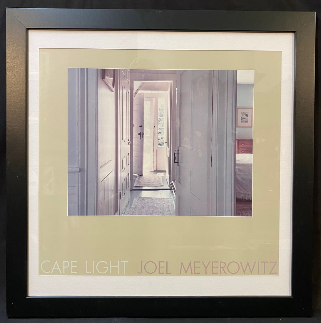 THE HARTWIG HOUSE, TRURO, CAPE COD BY JOEL MEYEROWITZ (1938), 29.5IN x 29.5IN (75cm x 75cm): Joel Meyerowitz (1938) exhibit poster titled Hartwig House, Truro, Cape Cod. This piece is after the original which was produced in 1976. It is matted and framed under glass in a black frame. With fra