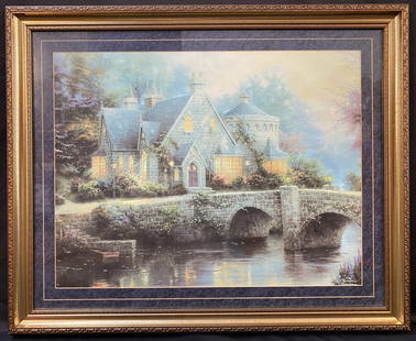 THOMAS KINKADE (1958-2012) LITHOGRAPH TITLED LAMPLIGHT MANOR, 28IN X 33IN (71cm x 84cm): Thomas Kinkade (1958-2012) lithograph titled Lamplight Manor. It is matted and framed under glass in a beautiful and ornate golden frame. It measures 28 inches x 33 inches. This piece was acquired fro