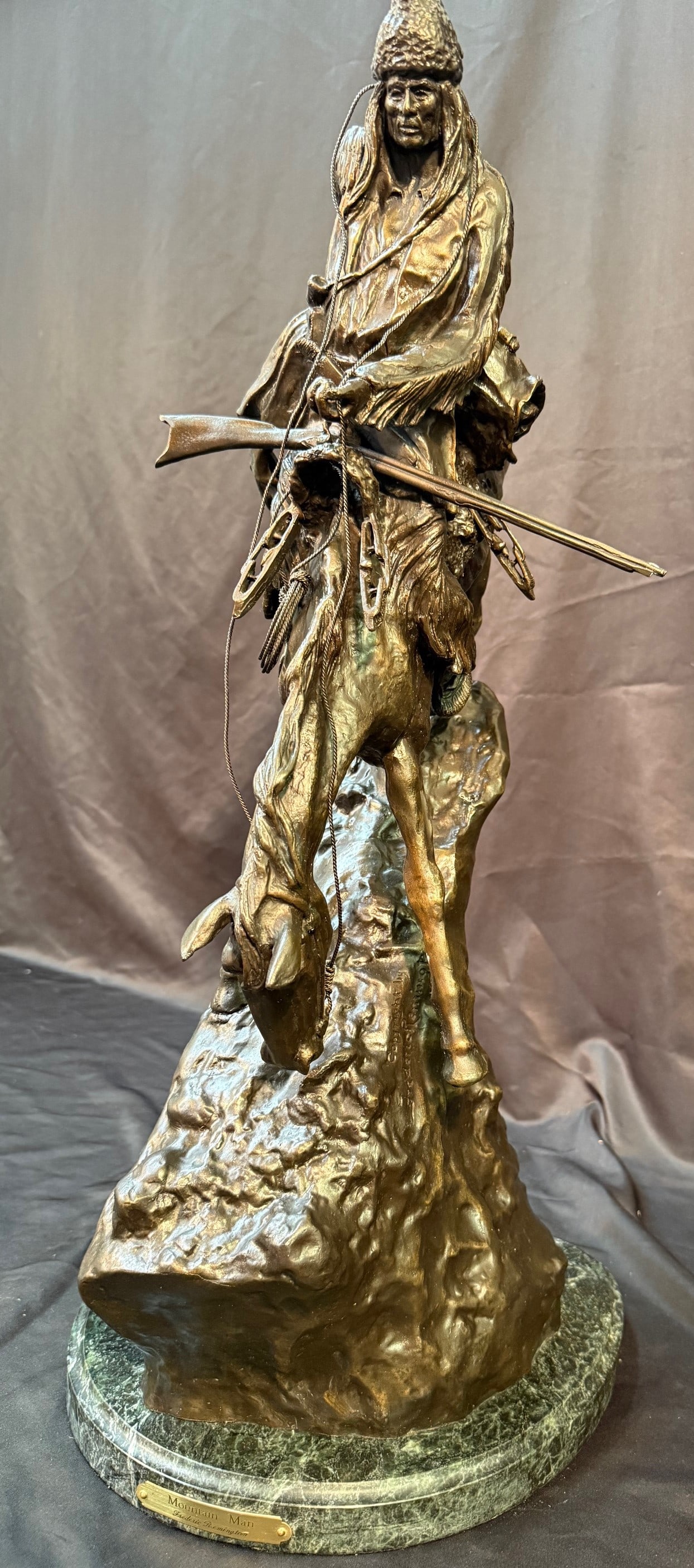 FREDERIC REMINGTON (1861-1909) BRONZE STATUE TITLED MOUNTAIN MAN, 12.5IN x 16IN x 27IN (32cm x 41cm (1 of 13)