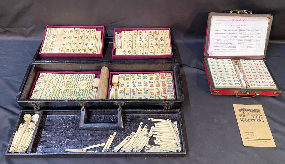 ANTIQUE BONE AND BAMBOO MAHJONG SET, 6IN X 3.5IN X 20IN (15cm x 9cm x 51cm): Antique 144-piece Chinese Mahjong set. There are 144 bone and bamboo tiles and all of the betting sticks are bone. There are 4 additional blank pieces. The design on the bone tiles is carved and paint