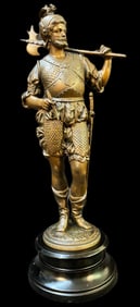CAST METAL STATUE ON A WOODEN PLINTH OF A NOBLEMAN WITH AN AX, 14.75IN TALL (37cm)
