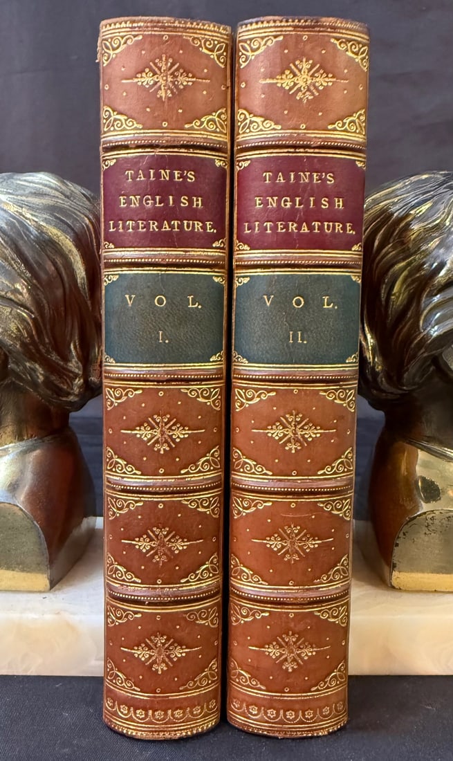 HISTORY OF ENGLISH LITERATURE BY H.A. TAINE, 2 VOLUMES, 1887: 1887. London. Chatto and Windus, Publisher. Complete in 2 volumes. All volumes Very Good+ condition. Written entirely in English. All volumes are bound in tan full leather hard covers, and are embosse