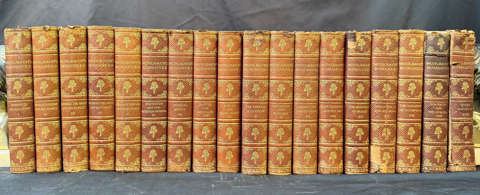 MUHLBACH’S ROMANCES, 18 VOLUMES, 1893: 1893. Philadelphia. John D. Morris and Company, Publisher. 18 Volumes. All volumes Very Good to Good condition. Written entirely in English. All volumes are bound in light brown half leather hard cove