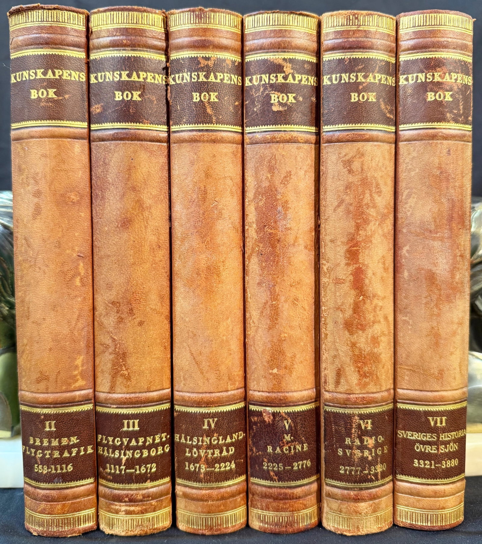 KUNSKAPENS BOK, 6 VOLUMES, 1938: 1938. Stockholm. Bokforlaget Natur Och Kultur, Publisher. Complete in 7 volumes, missing volume 1. All volumes Very Good+ condition. Written entirely in Swedish. All volumes are bound in tan full leat