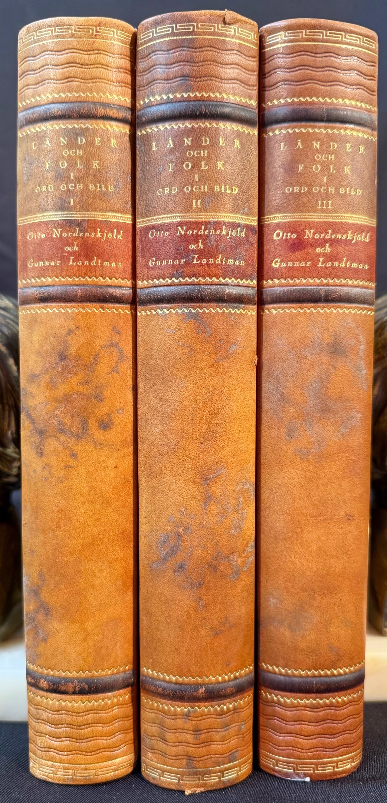 LANDER OCH FOLK, 3 VOLUMES, 1927: 1927. Stockholm. Bokforlaget Natur Och Kultur, Publisher. Complete in 3 volumes. All volumes Very Good+ condition. Written entirely in Swedish. All volumes are bound in tan full leather hard covers, a