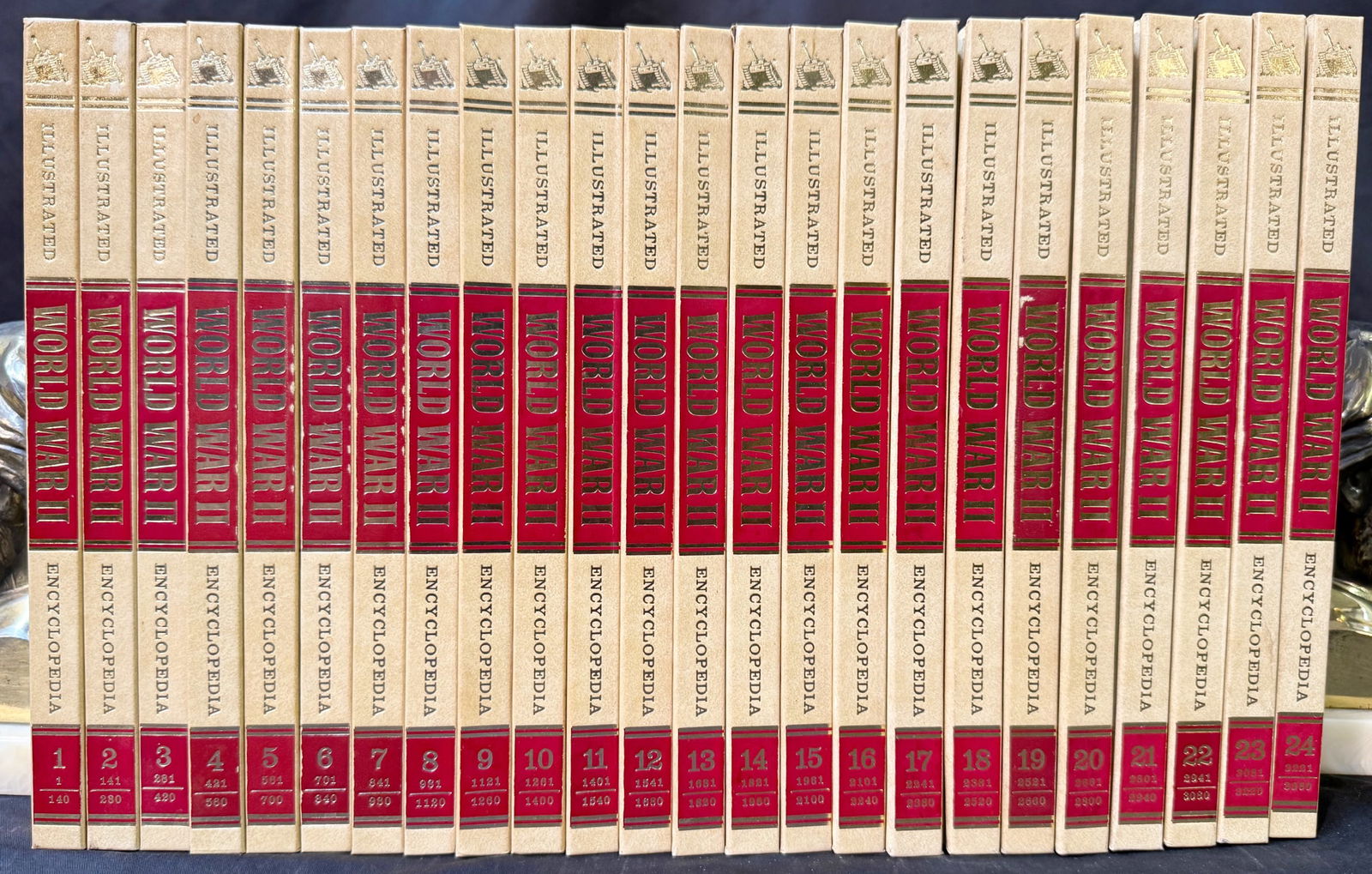 ILLUSTRATED WORLD WAR II ENCYCLOPEDIA, 24 VOLUMES: 1978. Mary Knoll, NY. Published by H. S. Stuttman and printed by Orbis Publishing limited. All volumes are in Near Fine, unread condition. All volumes are bound in Ivory white hard covers, and embosse