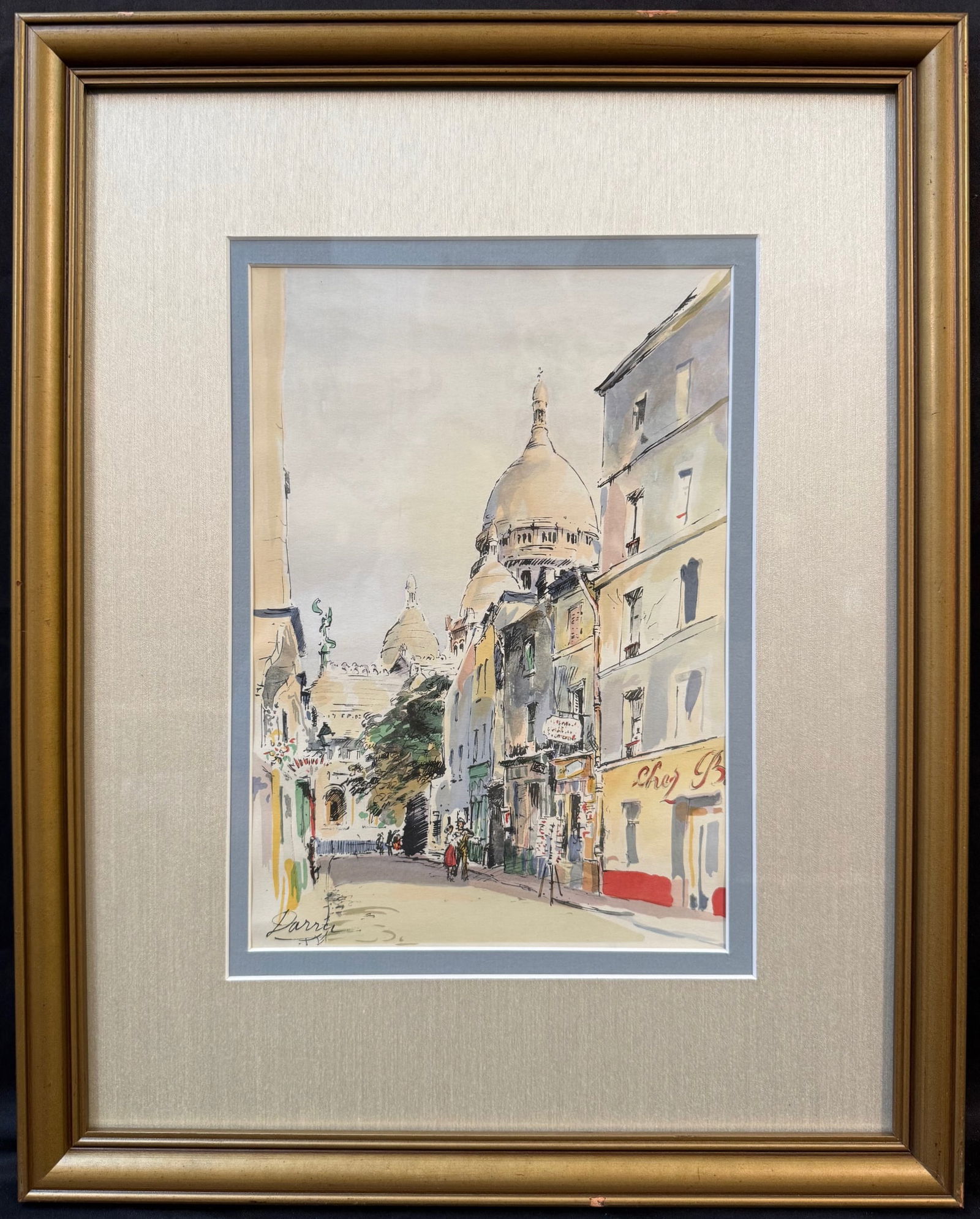 LITHOGRAPH BY ARTIST DARRU TITLED MONTMARTE, 16IN x 19IN (41cm x 48cm): A lithograph of Montmarte in Paris by artist Darru. This piece is double matted and framed under glass in a golden frame. With frame, it measures 16 inches x 19 inches. This piece was acquired from a
