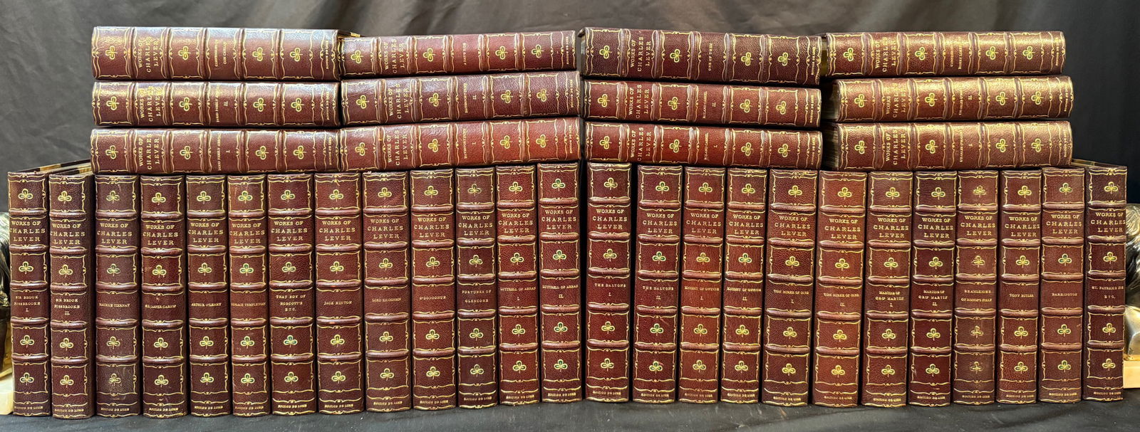 THE NOVELS OF CHARLES LEVER, EDITION DE LUXE, 37 VOLUMES, 1866: London. 1866. Downey and Company, Ltd, Publisher. All volumes in Near Fine condition. Complete in 37 volumes and is the limited edition de Luxe, it being 127 or 250. All volumes bound in dark brown; h