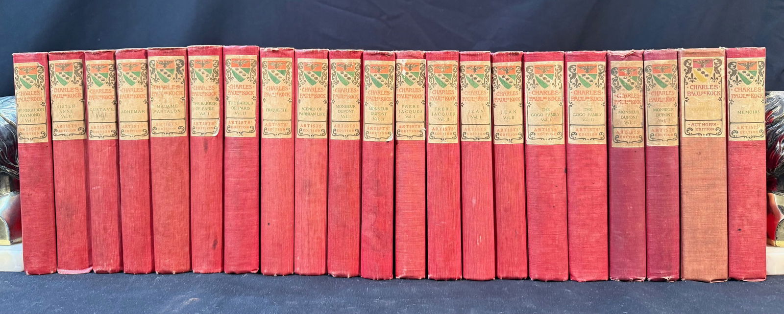 THE WORKS OF CHARLES PAUL DEKOCK, 21 VOLUMES, ARTISTS EDITION, 1903: Boston. 1903. The Frederick J. Quinby Company, Publishers. 21 volumes, all in Very Good+ to Very Good condition. All bound in full, red cloth hard cover and attached paper labels on the spines for tit