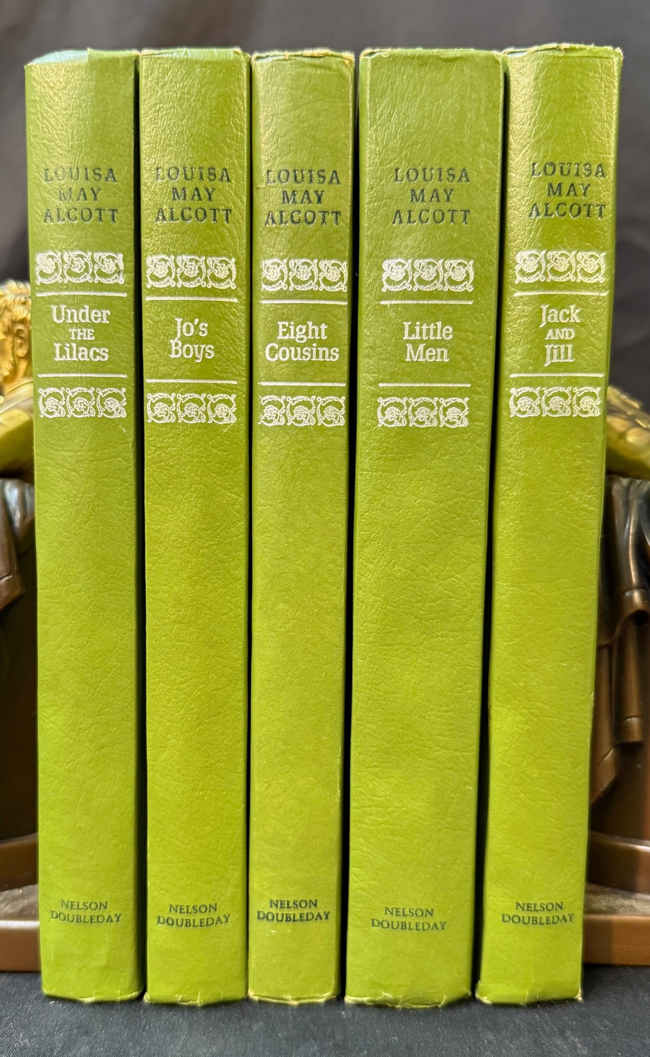 LOUISA MAY ALCOTT BOOK SET, 5 VOLUMES, 1955: Garden City, New York. 1955. Nelson Doubleday, Inc, Publisher. 5 volumes, all in Very Good+, unread condition. All bound in leatherette hard cover and all without dust jackets. There are no owner mark