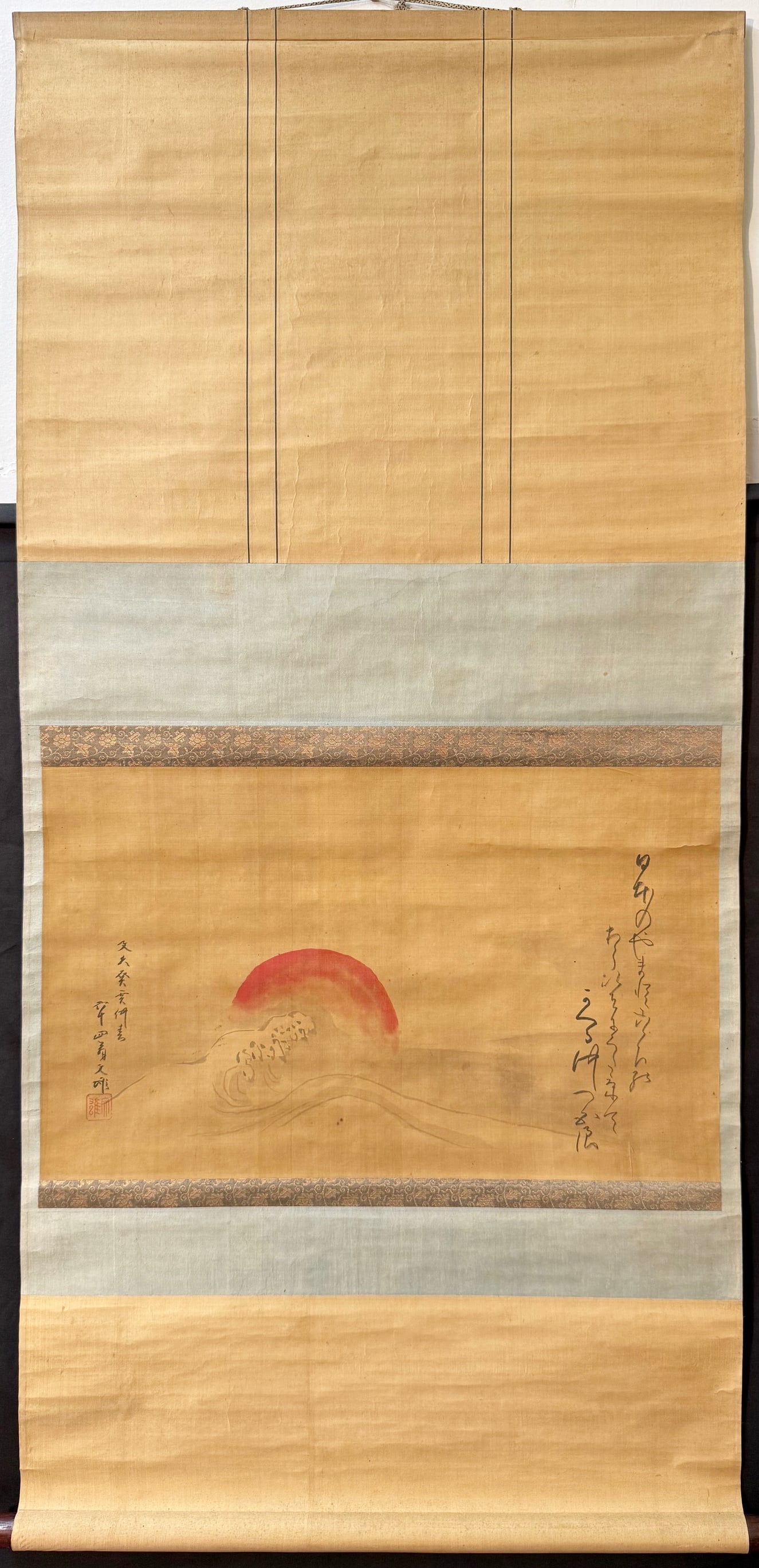 ANTIQUE ORIGINAL JAPANESE SCROLL PAINTING BY BUNSHO OF A SUN OVER A WAVE, 25IN x 49IN (64cm x 124cm): A Japanese hand painted scroll by Bunsho, who was active between 1850-1880. This painting shows a rising sun and poetic inscriptions, one of which states that this piece was painted in 1863, making it