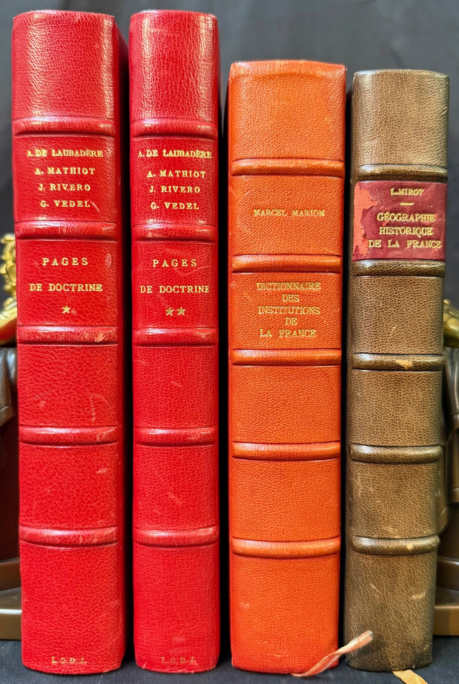 FRENCH LEGAL, HISTORICAL AND GEOGRAPHICAL BOOK SET, 4 VOLUMES: 1923, 1980. Paris. All four volumes are half bound in leather, with marbled boards. Here are the four volumes. Pages de Doctrine (1980), 2 volumes. Written by André de Laubadère, André Mathiot, Jea