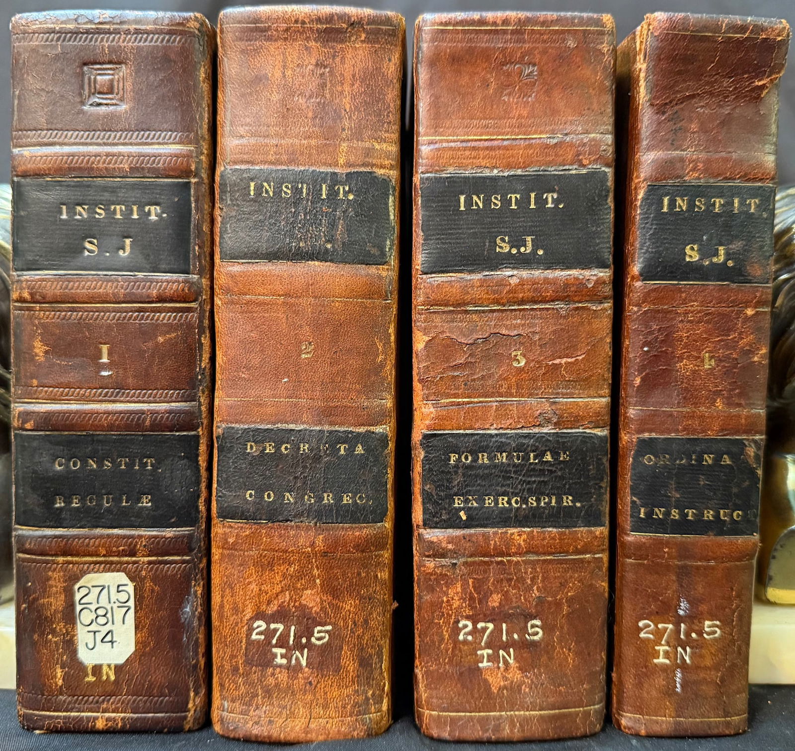 CONSTITUTIONES SOCEITATIS JESU, CUM EARUM DECLARATIONIBUS, 4 VOLUMES, 1827: 1827. Avenione, Italy. Ex Typographia Francisci Seguin, Publisher. Complete in 4 volumes. All volumes are in Very Good condition. Written entirely in Latin. All volumes are bound in full brown leather