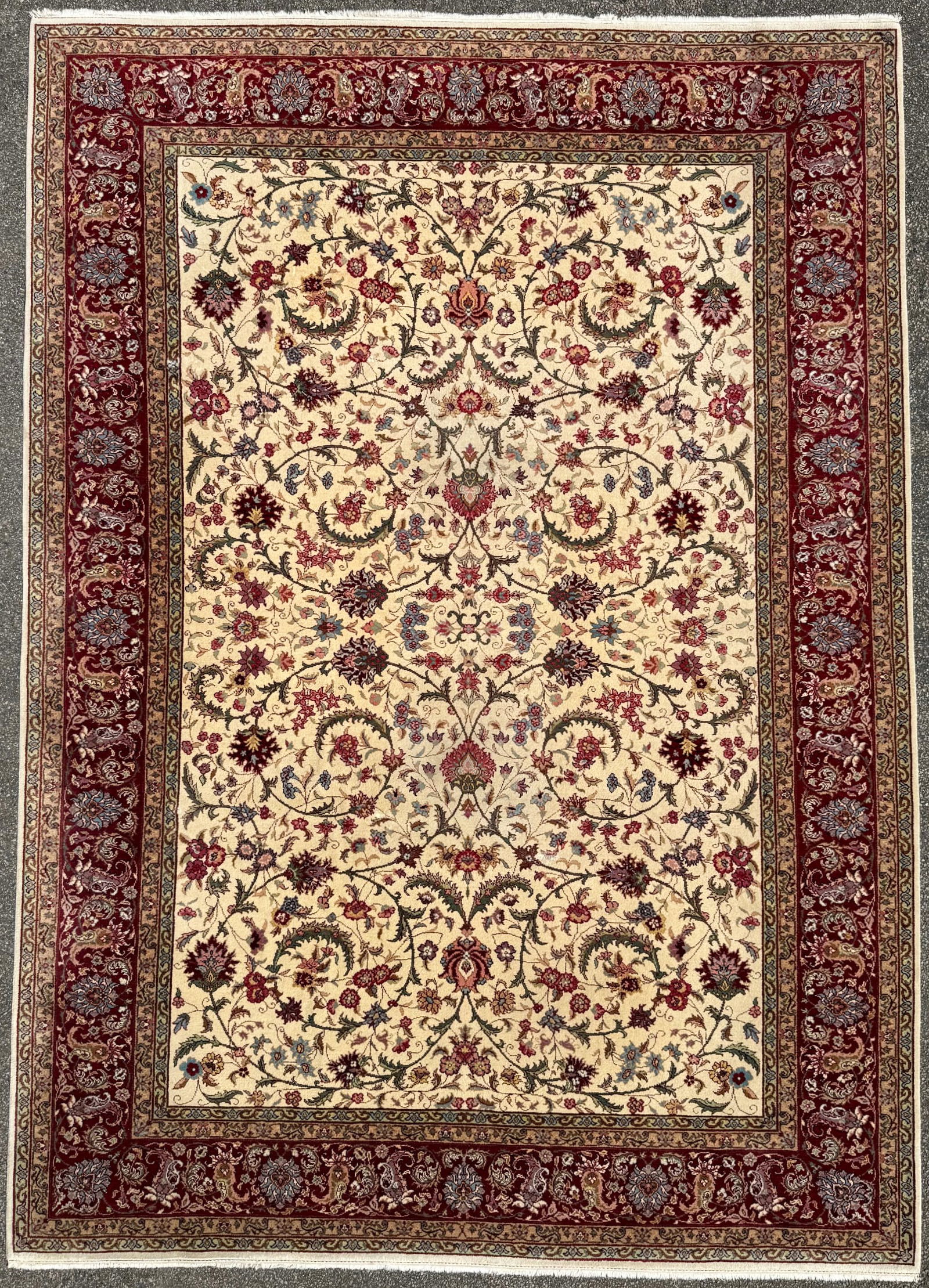 SAROUK HAND KNOTTED RUG, 10.0 x 14.0 (305cm x 427cm): Sarouk rug was hand knotted in India of 100% natural wool and has a cotton foundation. The rug has full, wool piles and is in like new condition. Beautiful colors with excellent quality. No holes or r