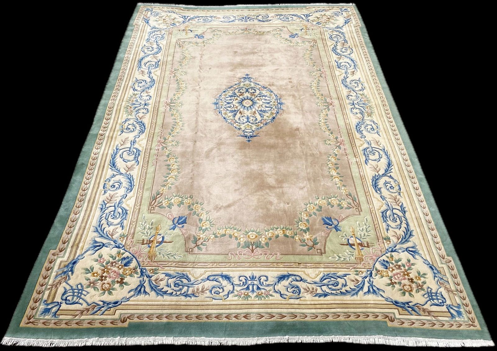 MANSION SIZED AUBUSSON HAND KNOTTED RUG, 12.1 x 17.9 (368cm x 541cm): French Styled Aubusson carved rug was hand knotted in China of 100% natural wool on a cotton foundation. The rug has very thick (1 inch) wool piles and is in like new condition. Beautiful colors and m