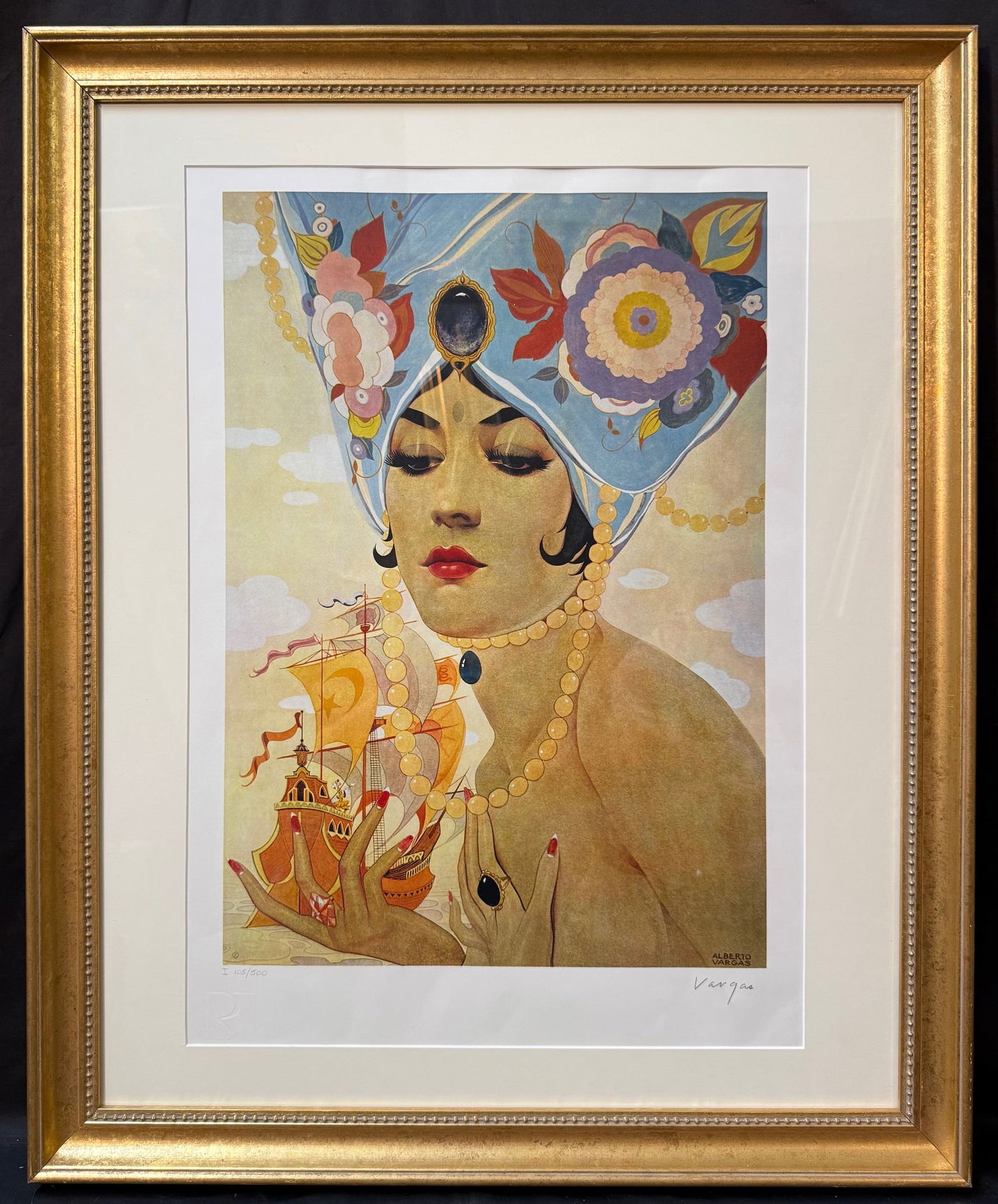 ALBERTO VARGAS (1896-1982) HAND SIGNED, LIMITED EDITION LITHOGRAPH TITLED SCHEHERAZADE, 27.5IN x: Color lithograph on paper depicting an exotic fantasy portrait of a female figure adorned with elaborate jeweled headdress and pearl jewelry, holding an ornate sailing ship against a dreamlike sky. Th