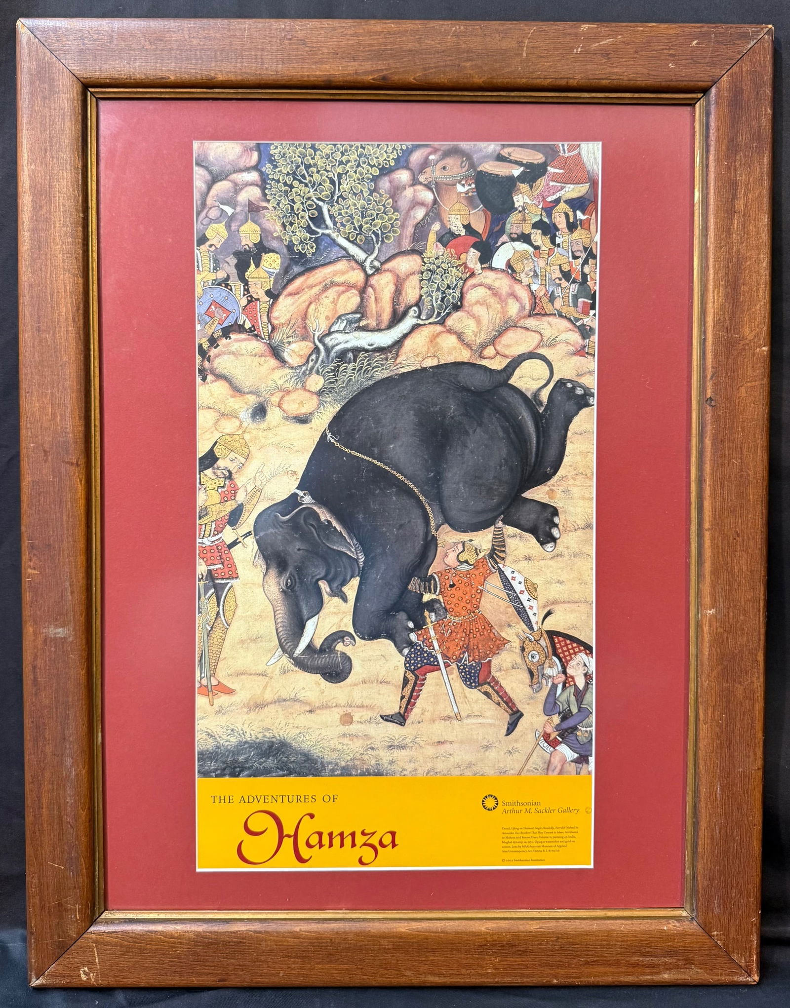 ORIGINAL ADVENTURES OF HAMZA SMITHSONIAN EXHIBIT POSTER, 21.5IN x 28IN (55cm x 71cm): Original Adventures of Hamza exhibition poster for the Smithsonian in Washington DC in 2002. The underlying piece used for the poster is titled Lifting an Elephant Single-Handedly, Farrukh-Nizhad So A