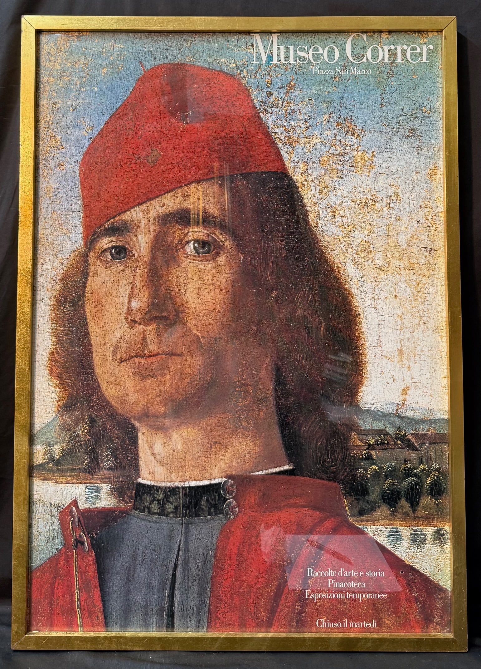 MUSEO CORRER, VENICE EXHIBITION POSTER, 28IN x 40IN (71cm x 102cm): A finely produced museum exhibition poster issued by the Museo Correr, Venice, featuring a celebrated Venetian Renaissance portrait traditionally associated with Giovanni Bellini or his circle. The im