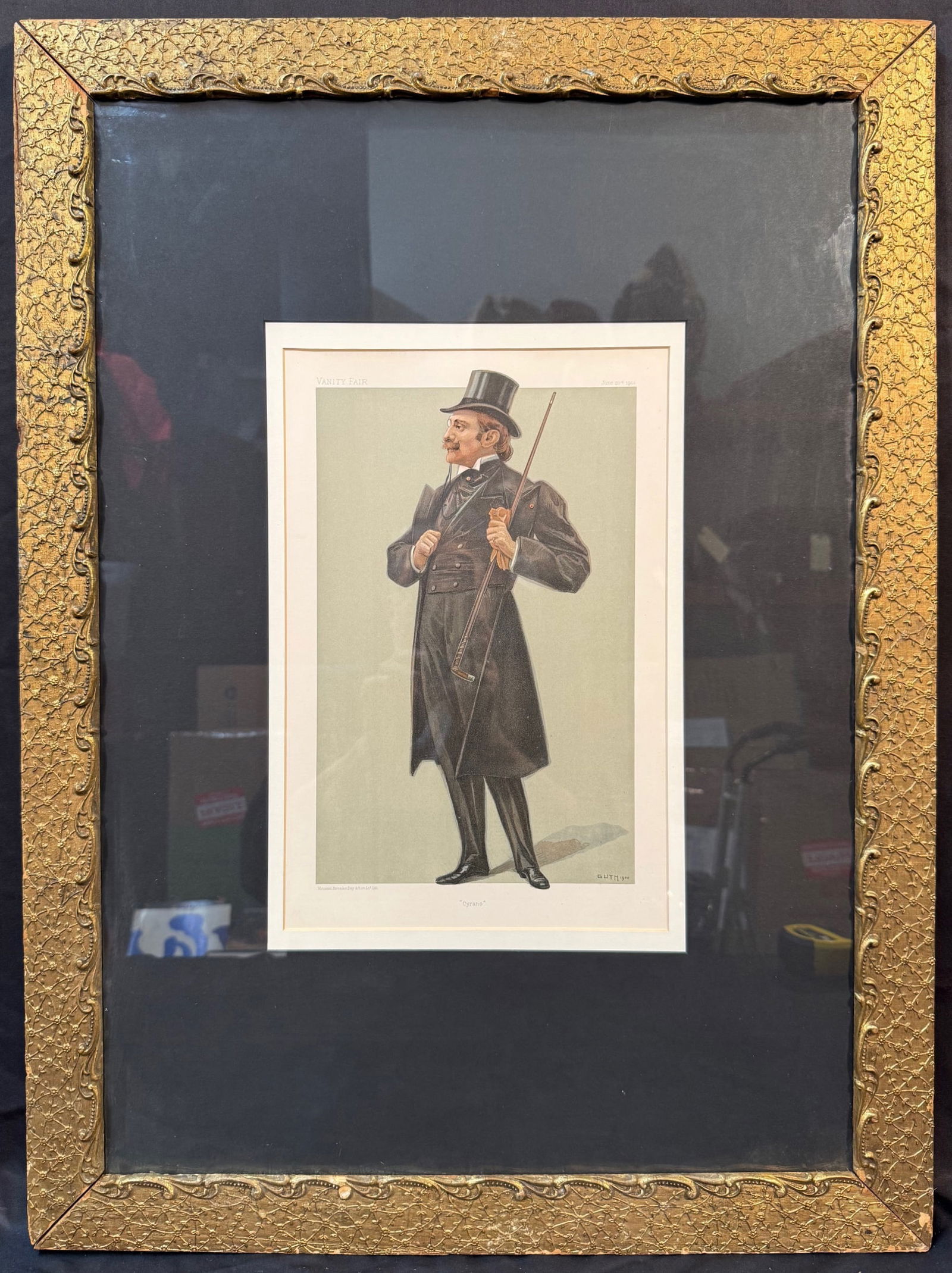 VANITY FAIR CHROMOLITHOGRAPH BY JEAN BAPTISTE GUTH (1855-1922) TITLED CYRANO, 23IN x 31IN (58cm x: Chromolithograph by Jean Baptiste Guth (1855-1922) titled “Cyrano”. The original piece was produced by Vanity Fair magazine in 1901 in a series of pictures called Men of the Day. It is double
