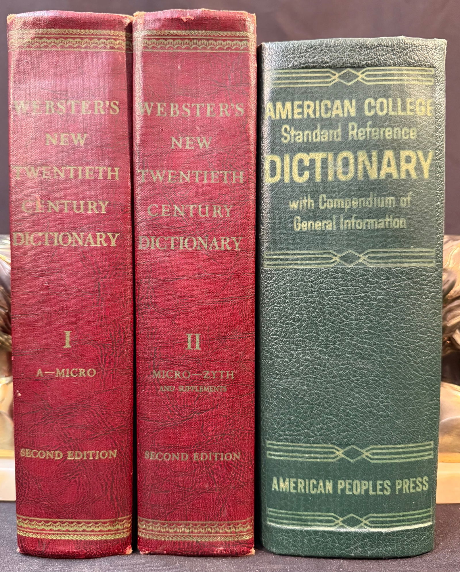 TWO DICTIONARIES IN THREE VOLUMES, SECOND EDITION, 1958: 1958. Cleveland and New York. Encyclopedia Britannica Inc., Publishers. One 2 volume set and another volume by itself. All volumes are in Very Good condition. All volumes are faux leather hardback wit