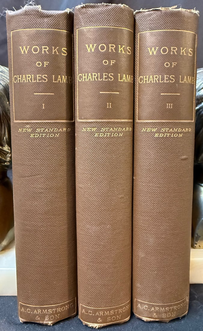 THE WORKS OF CHARLES LAMB, NEW STANDARD EDITION, A.C. ARMSTRONG & SON, 1886, 3 VOLUMES: 1886. New York. A.C. Armstrong, Publisher. 5 volumes in 3 volumes, all in Very Good condition. All bound in full, brown cloth hard cover and gold embossed on the spines for title. There are no owner m