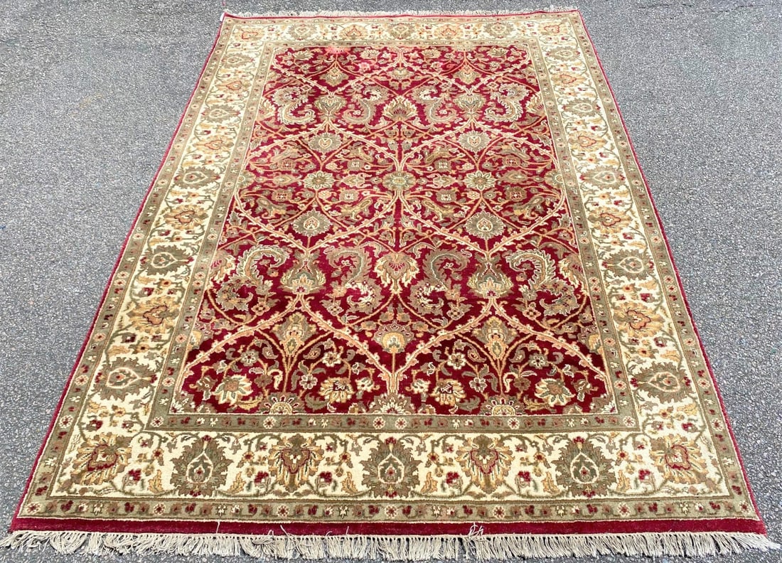 JAIPUR HAND KNOTTED RUG – 6.0 x 9.0: Jaipur rug is hand knotted of 100 percent wool in India, on a cotton foundation. The rug has full, wool piles and is in excellent condition. It is thick and plush. This rug was acquired from an establ