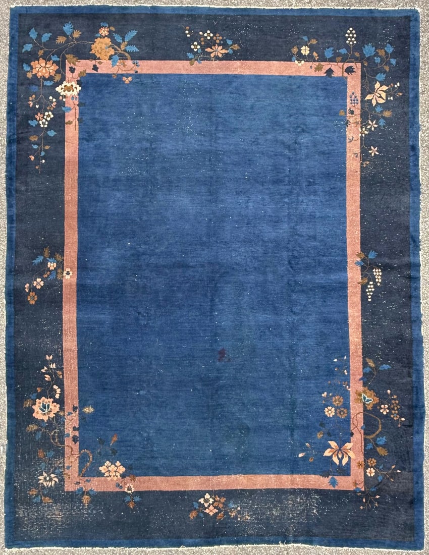 ANTIQUE CHINESE NICHOLS ART DECO HAND-KNOTTED RUG, INDIGO FIELD, MINIMALIST OPEN DESIGN, 1920S, 8.11: A striking example of an early 20th century Chinese Art Deco, Nichols style carpet, defined by its expansive indigo field and restrained botanical composition. This rug has medium to low wool piles an